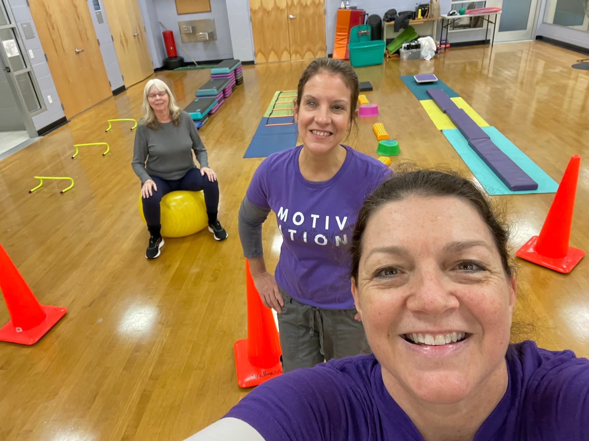 Kathy Clark and the Moxie Mobility Training team in the fitness studio
