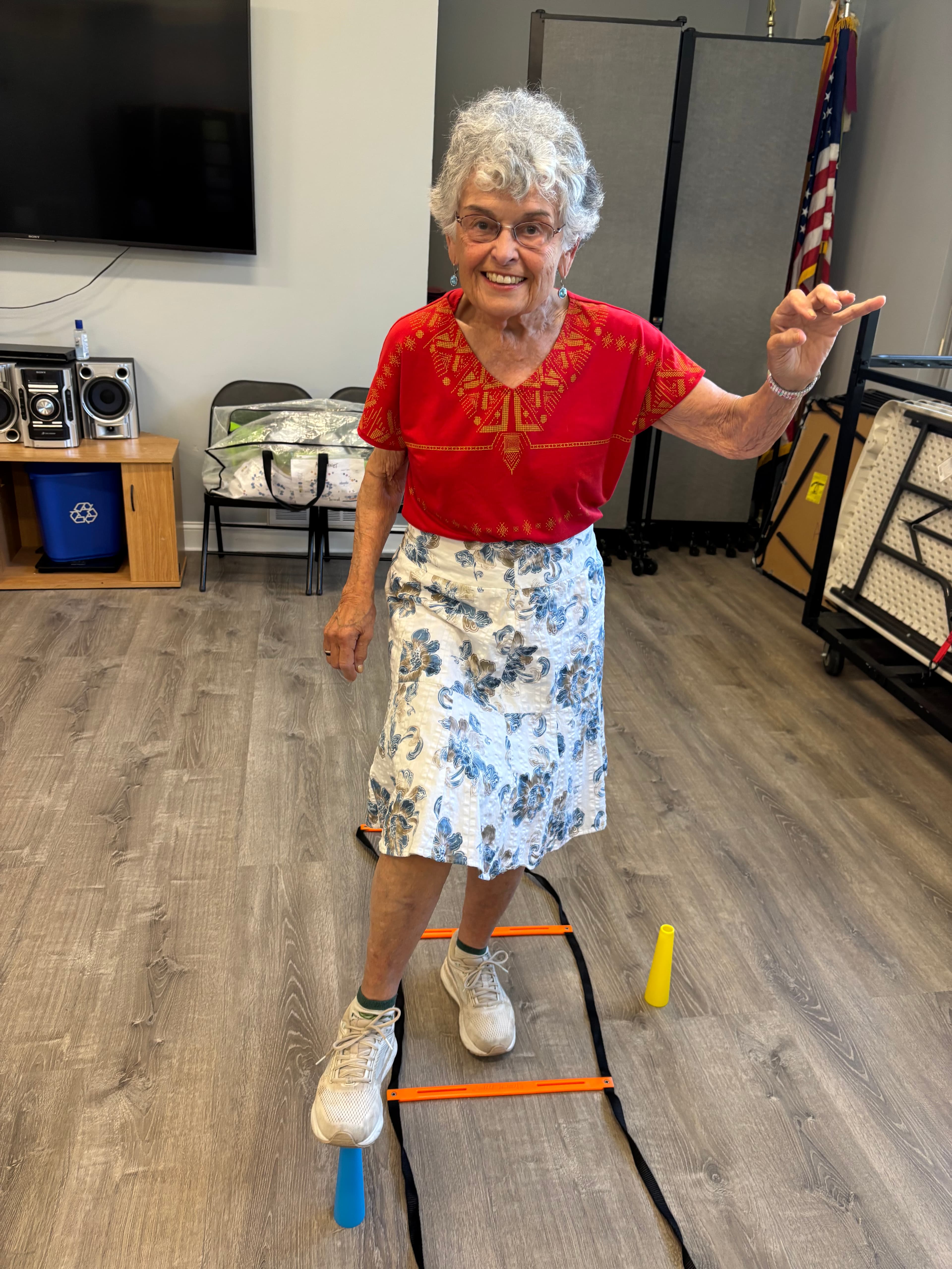 Nancy Jordan, Moxie Mobility Training volunteer, doing agility ladder exercises